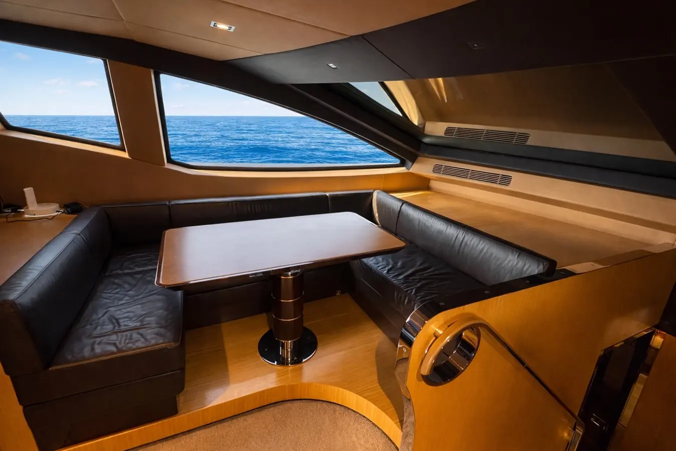 Azimut 88 pilothouse dinette with panoramic open sea views