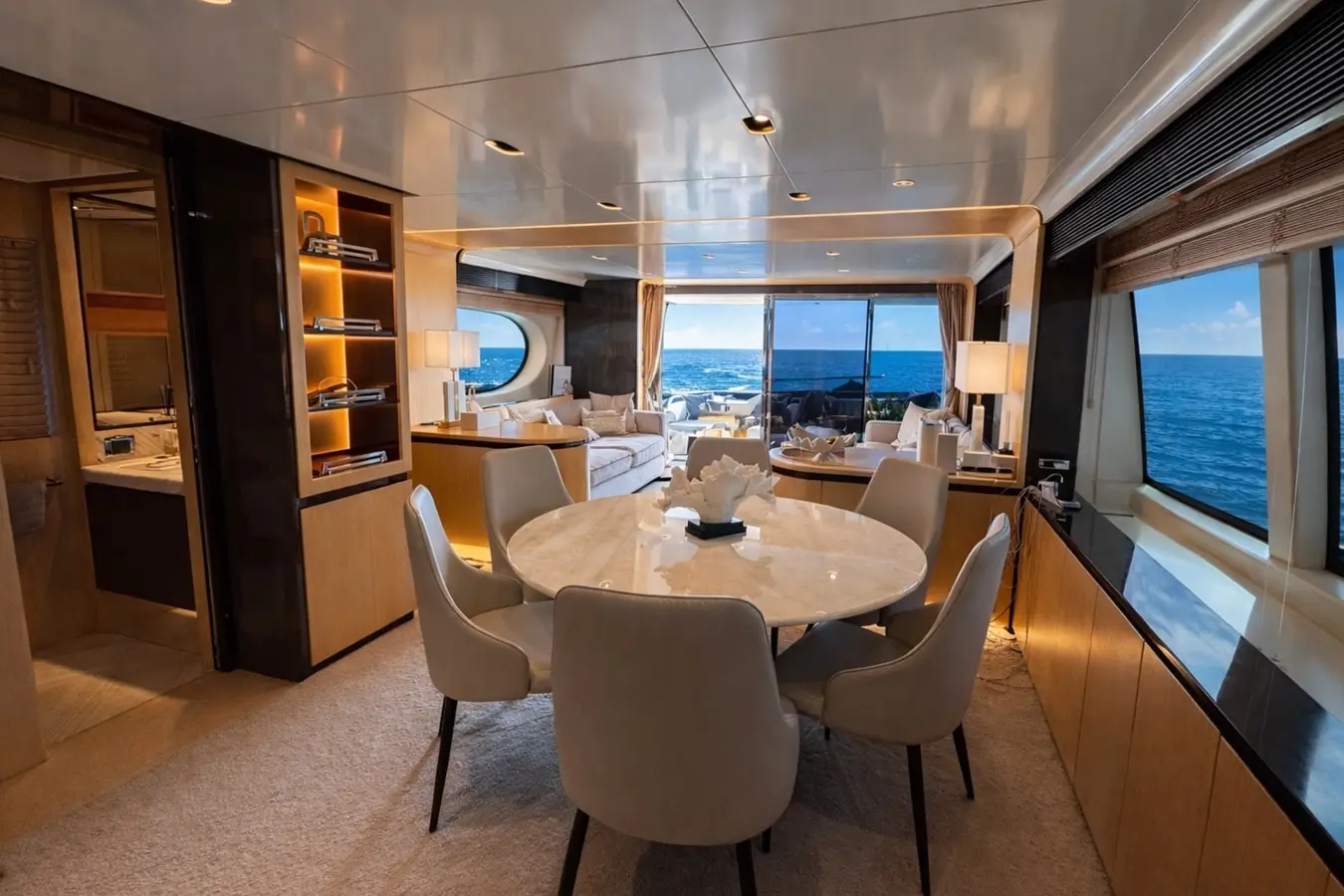 Azimut 88 round dining table forward of the main saloon