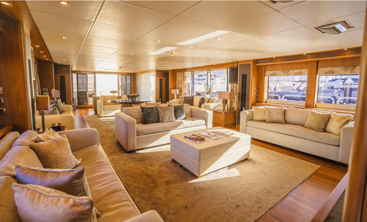 Sunseeker 40M main saloon aft view with twin cream sofa rows