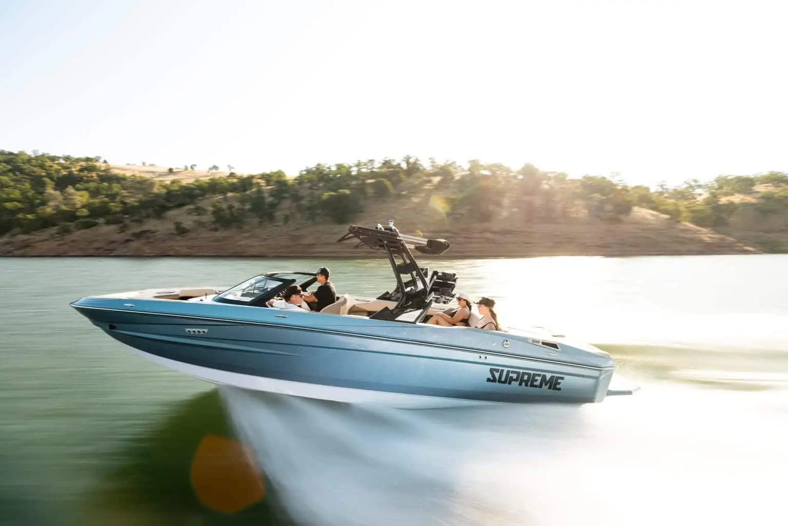 Supreme S240 profile underway on open water — press photo