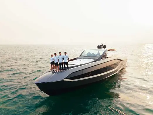 Lamborghini 63 yacht charter Dubai with guests onboard