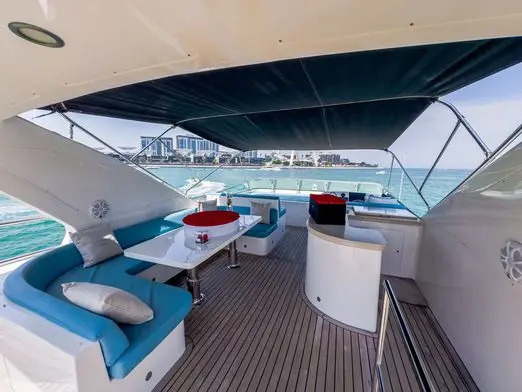 Cabo 77 luxury yacht outdoor seating area with modern sofa setup in Dubai