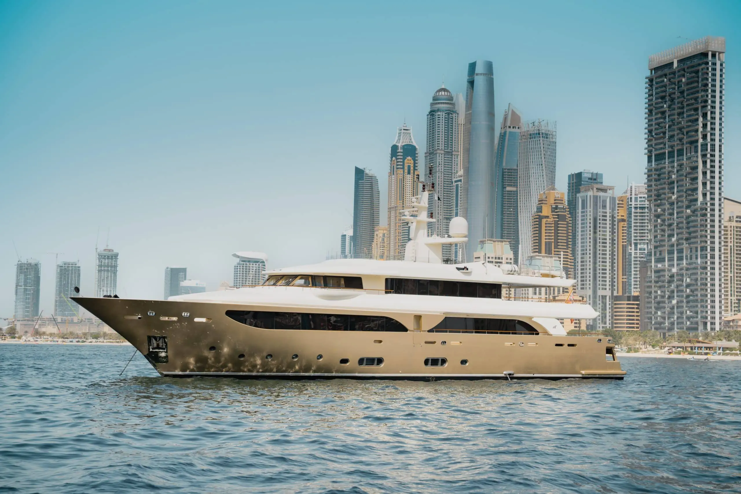MILA 141 luxury yacht with Dubai skyline in the background