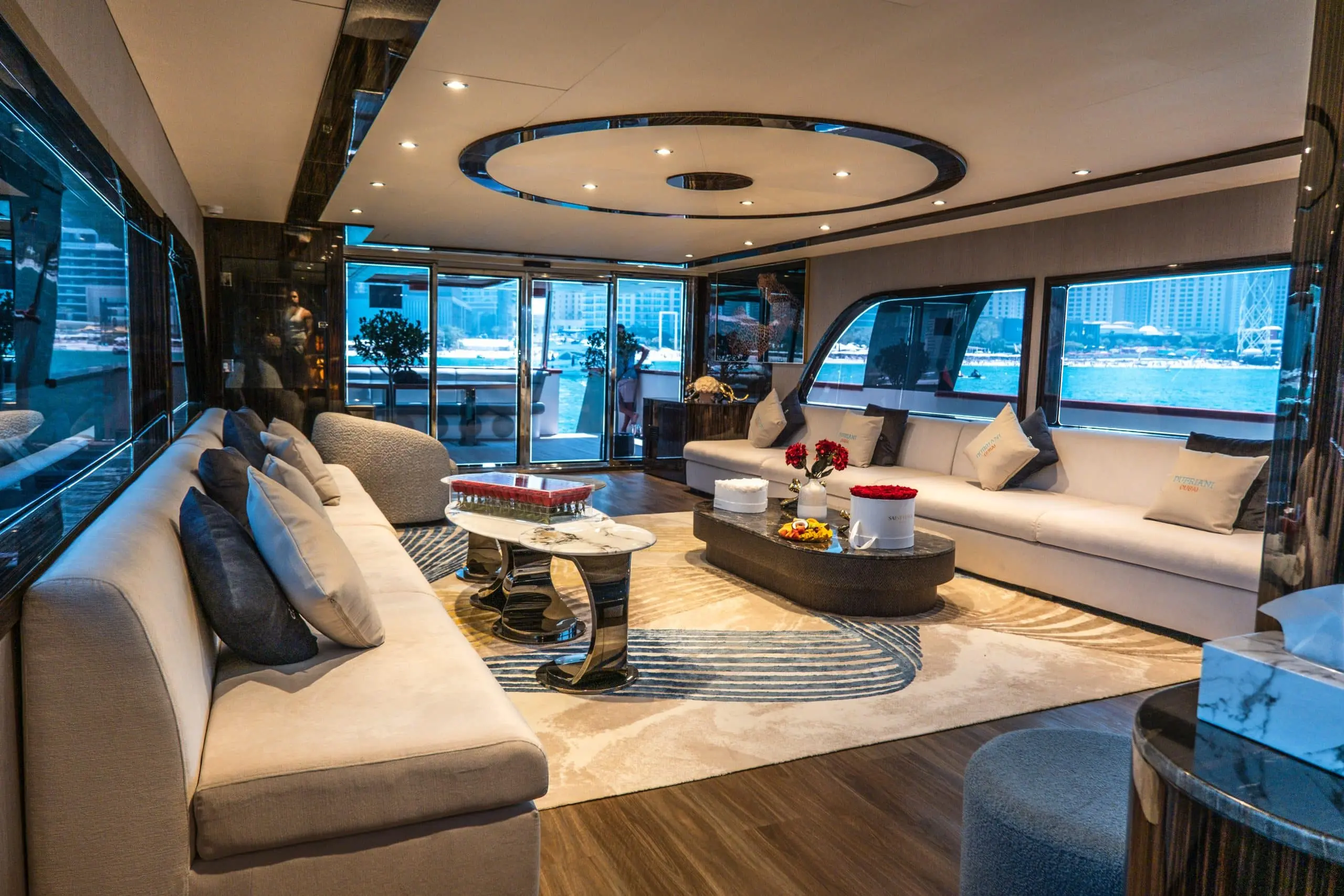 Luxury lounge with curved seating on Sapphire 150 Yacht Dubai