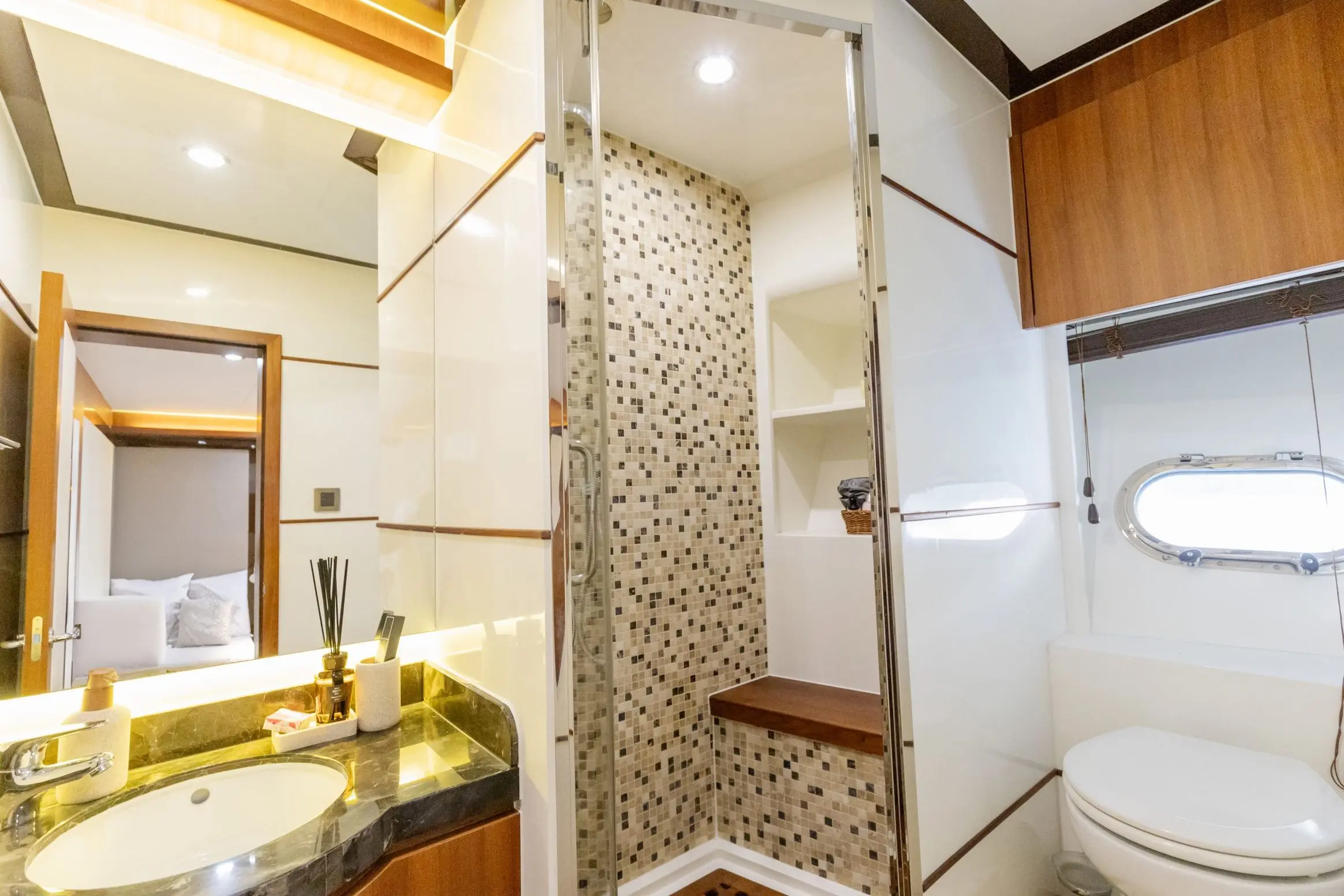 Cante 97 yacht ensuite bathroom with glass shower and marble finish