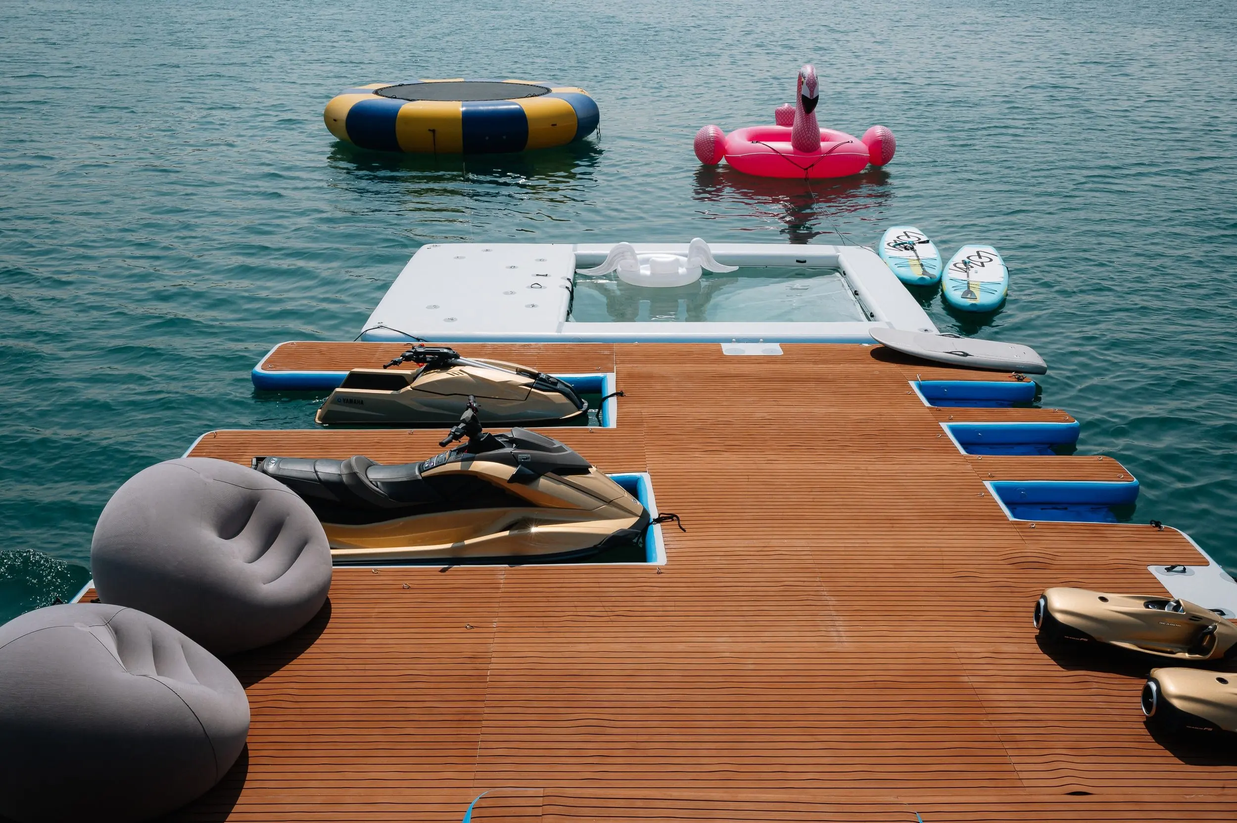Water activities setup behind Royalty 136 luxury yacht
