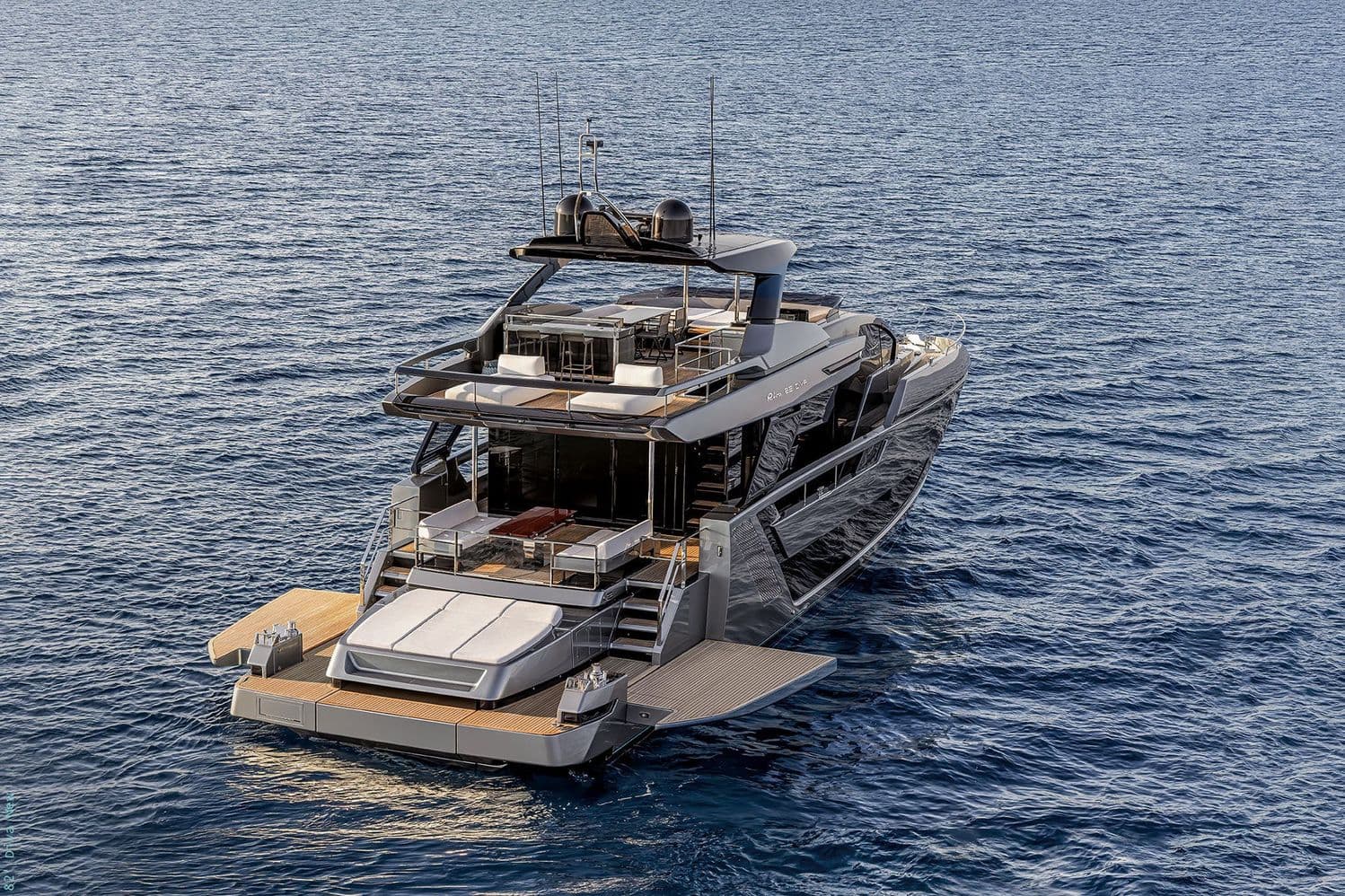Riva 82 Diva aerial stern view at anchor showing both aft decks