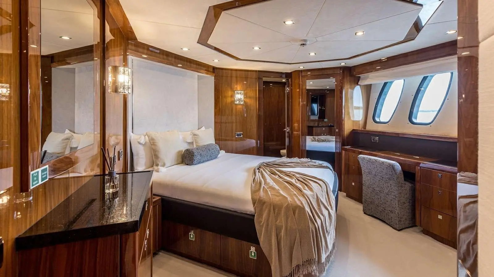 Sunseeker 37M guest cabin with TV console and vanity desk