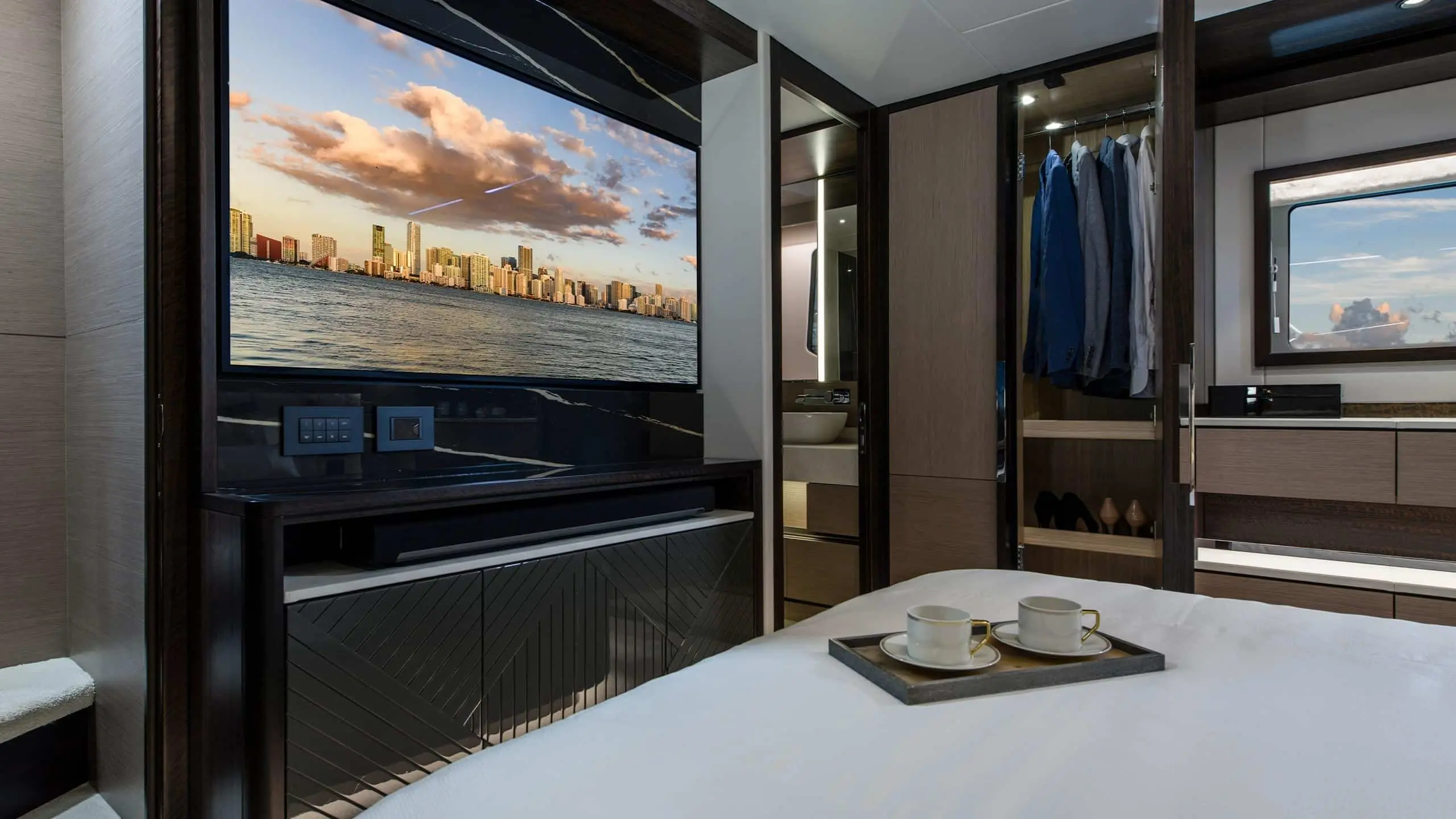 Sunseeker Manhattan 68 master cabin with skyline view — shipyard photo