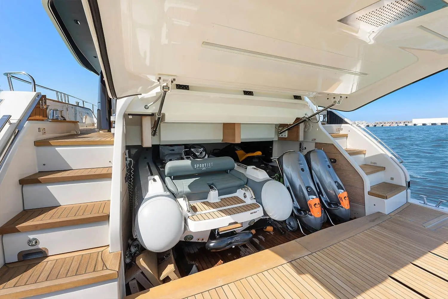 Cranchi Settantotto 78 tender garage with Williams SportJet and Seabobs