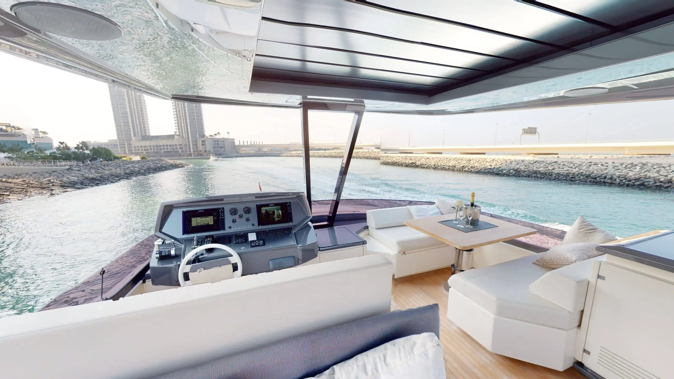Ferretti 780 flybridge helm station with navigation controls