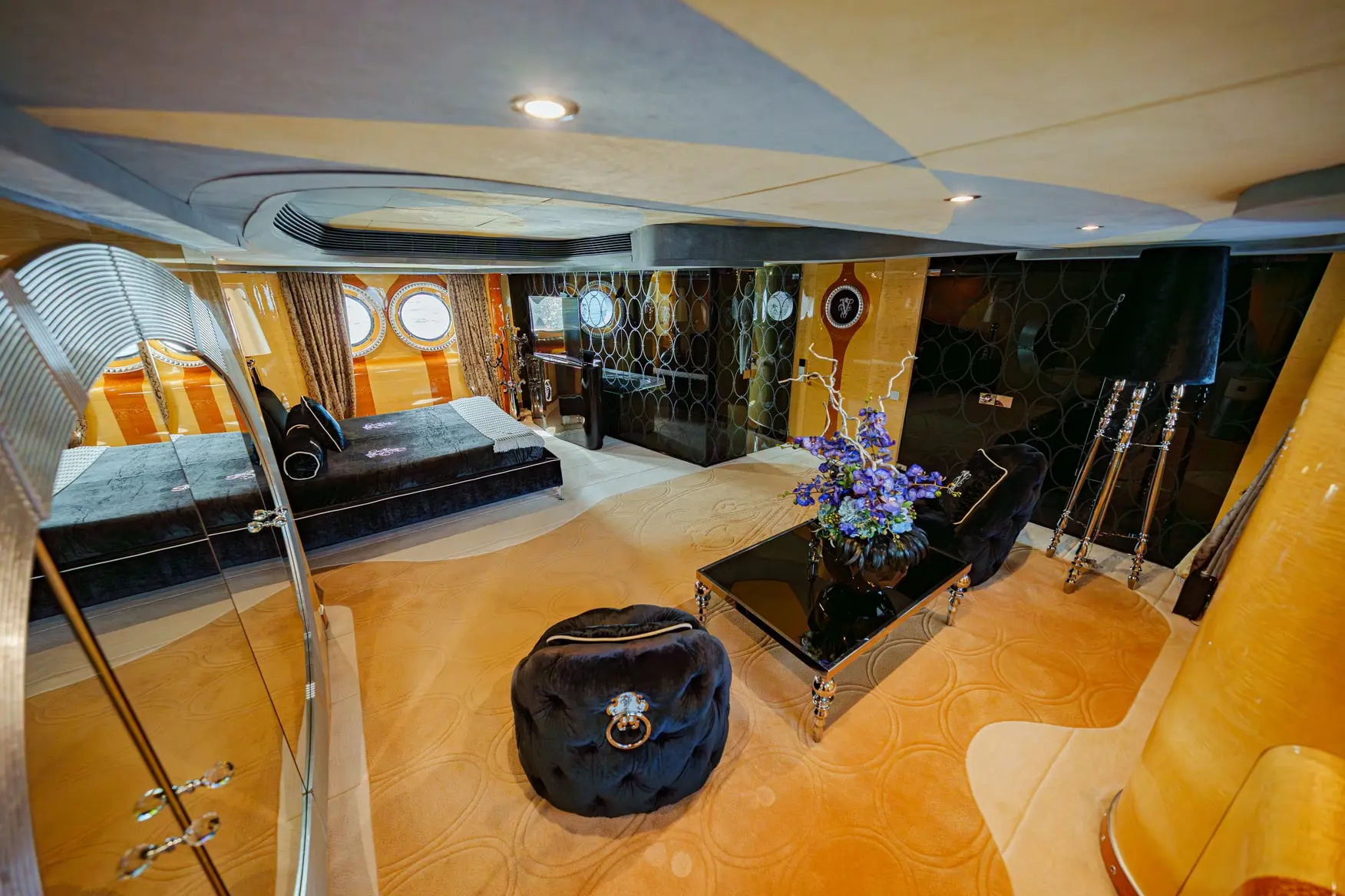 Thunder Superyacht entertainment room with large TV and modern seating