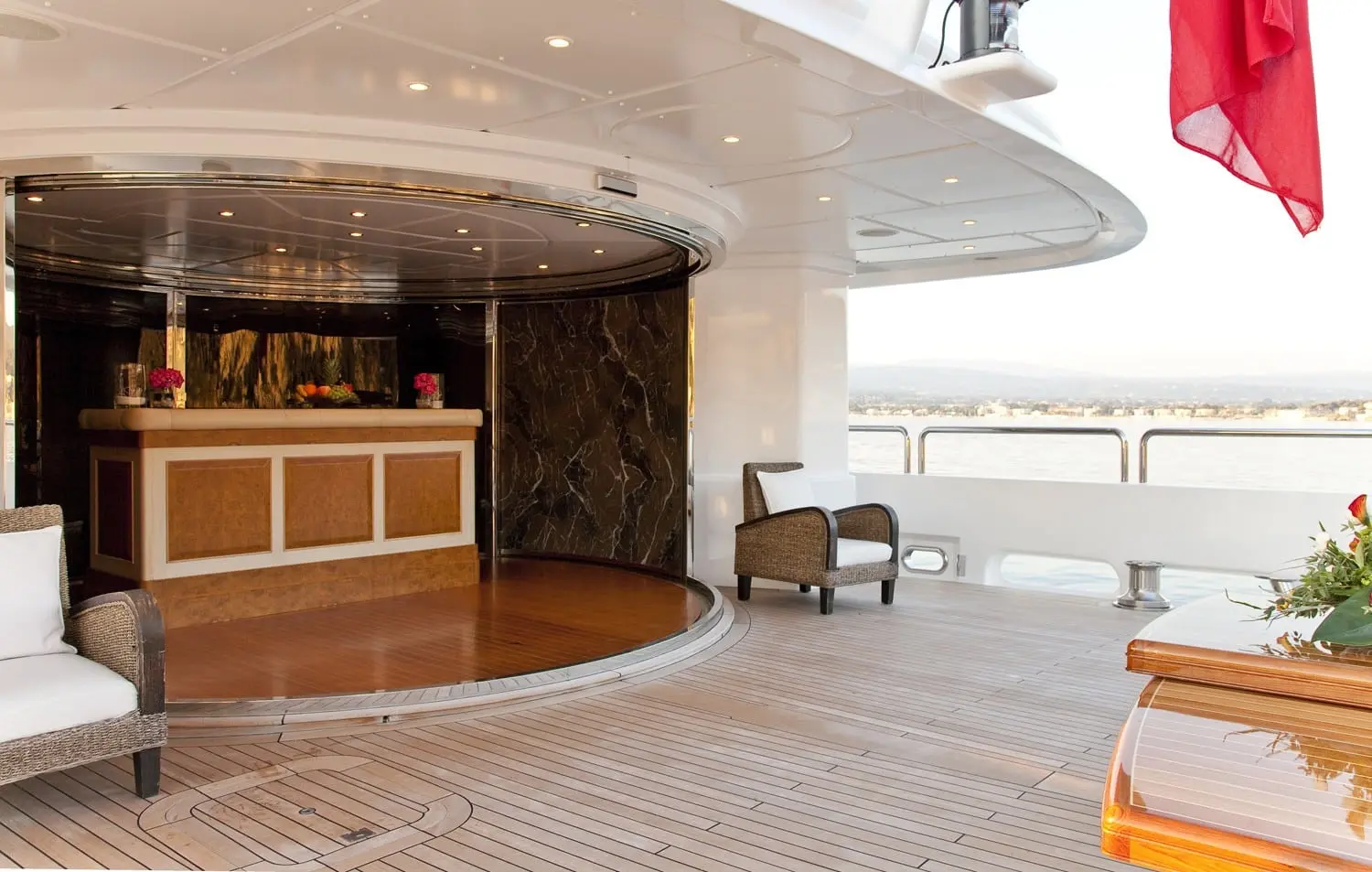 Athena 170 yacht indoor bar and lounge area with marble counter