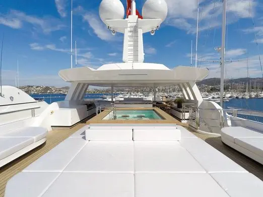 Skyfall 177 yacht aft deck pool with sun loungers and ocean view