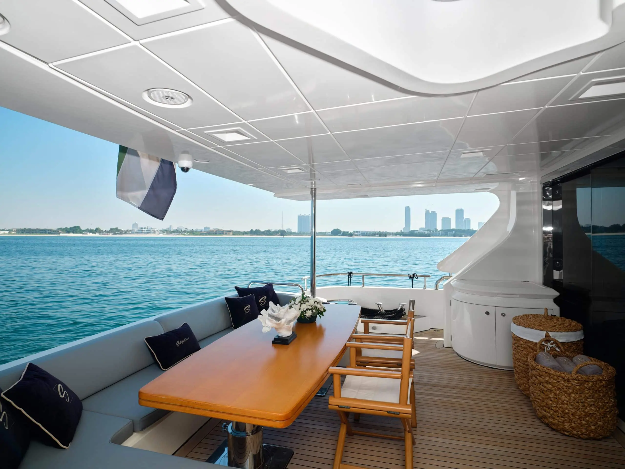 Outdoor dining table setup on Azimut 88 yacht