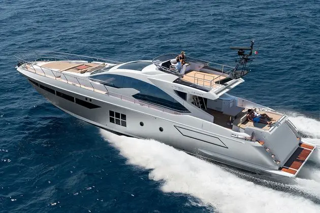 Azimut 77S aerial side view planing on blue water — shipyard photo