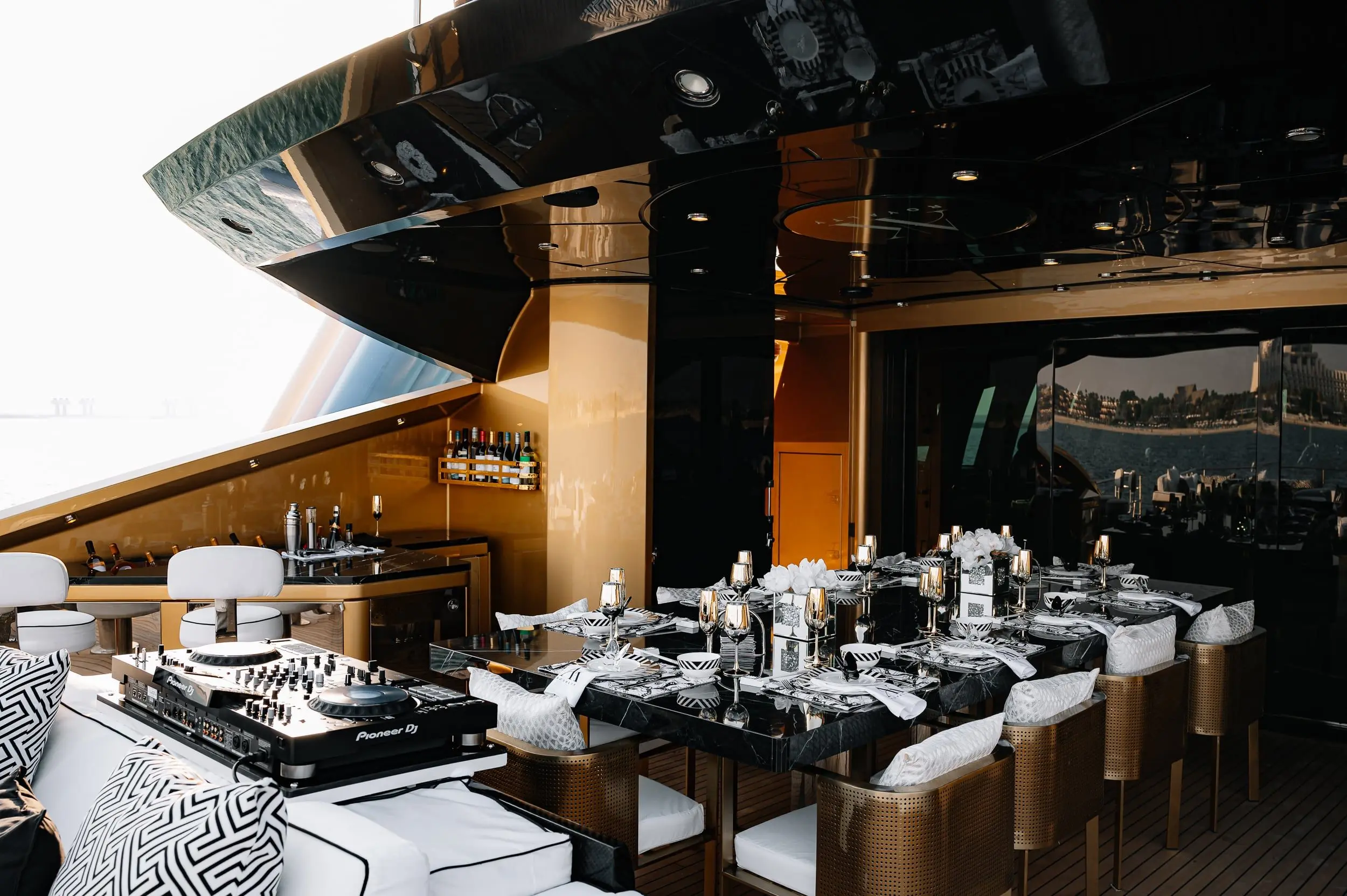 Elegant dining setup inside Royalty 136 luxury yacht