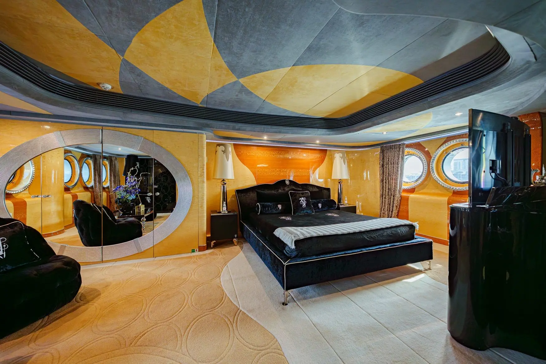 Thunder Superyacht cinema-style lounge with curved seating and modern lighting