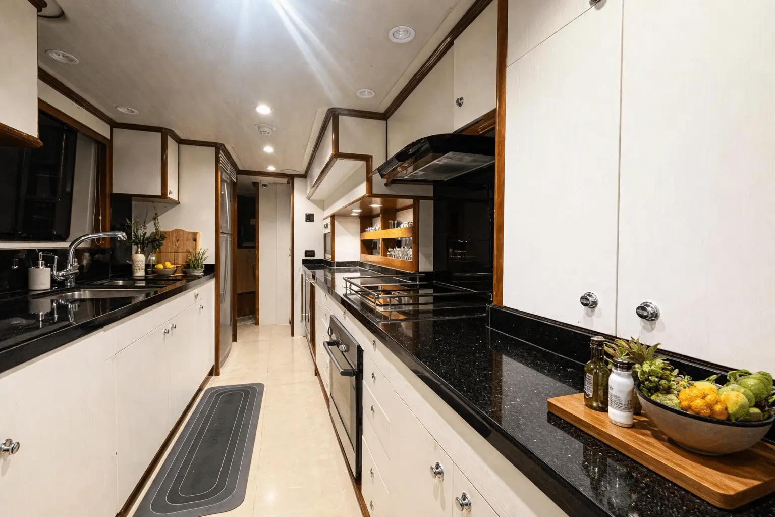 Benetti 120 luxury yacht galley kitchen with modern appliances and marble countertops