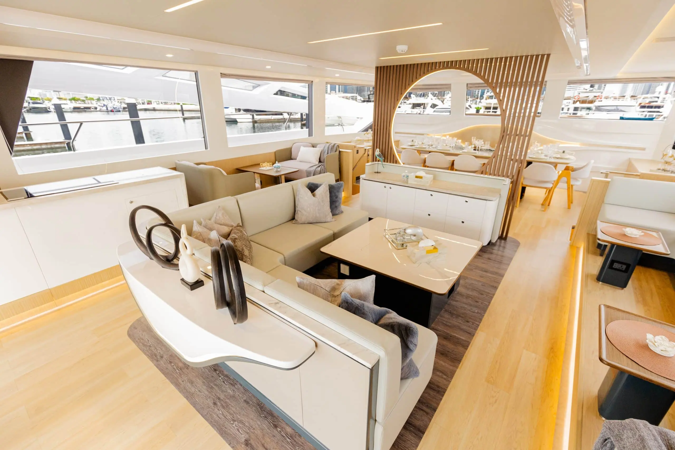 Zirve 72 motor yacht interior with bright lounge area and dining space