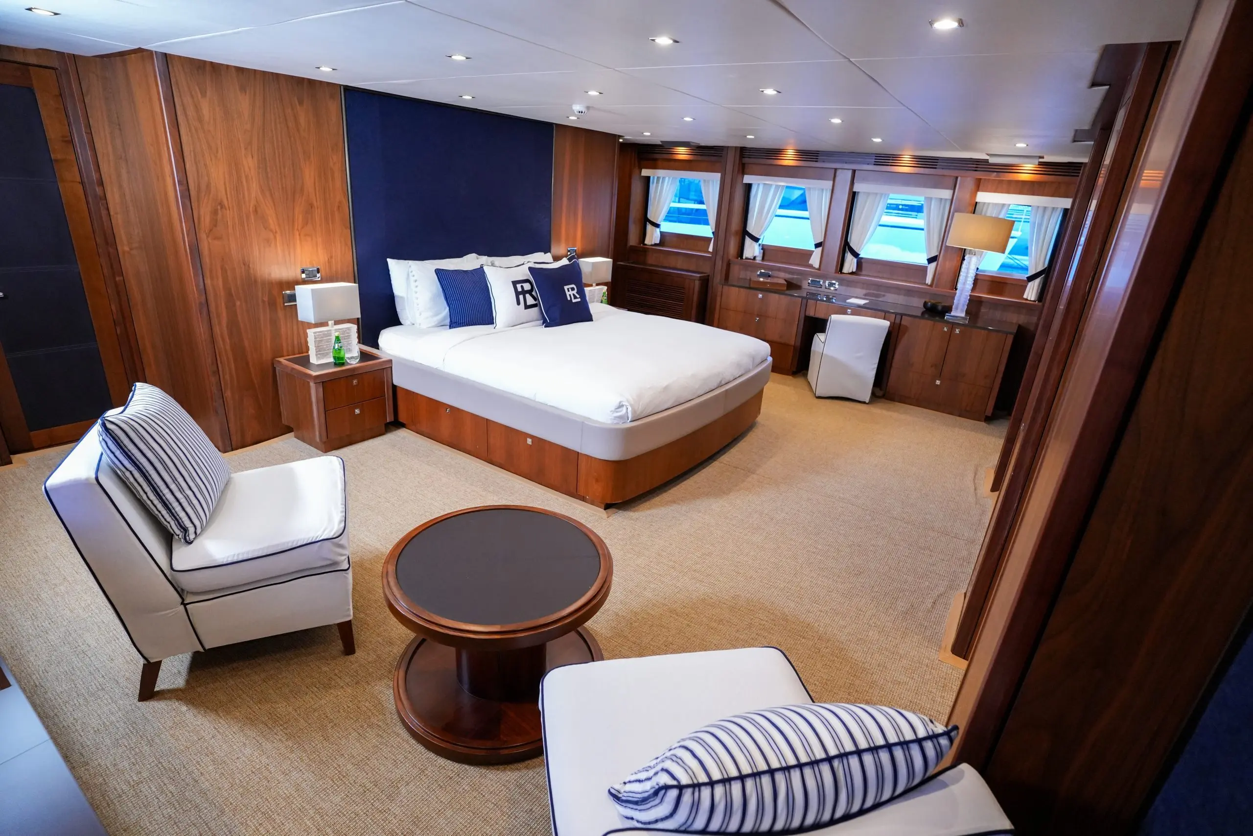 VIP guest cabin on Sunseeker 131 superyacht with modern lighting and plush bedding