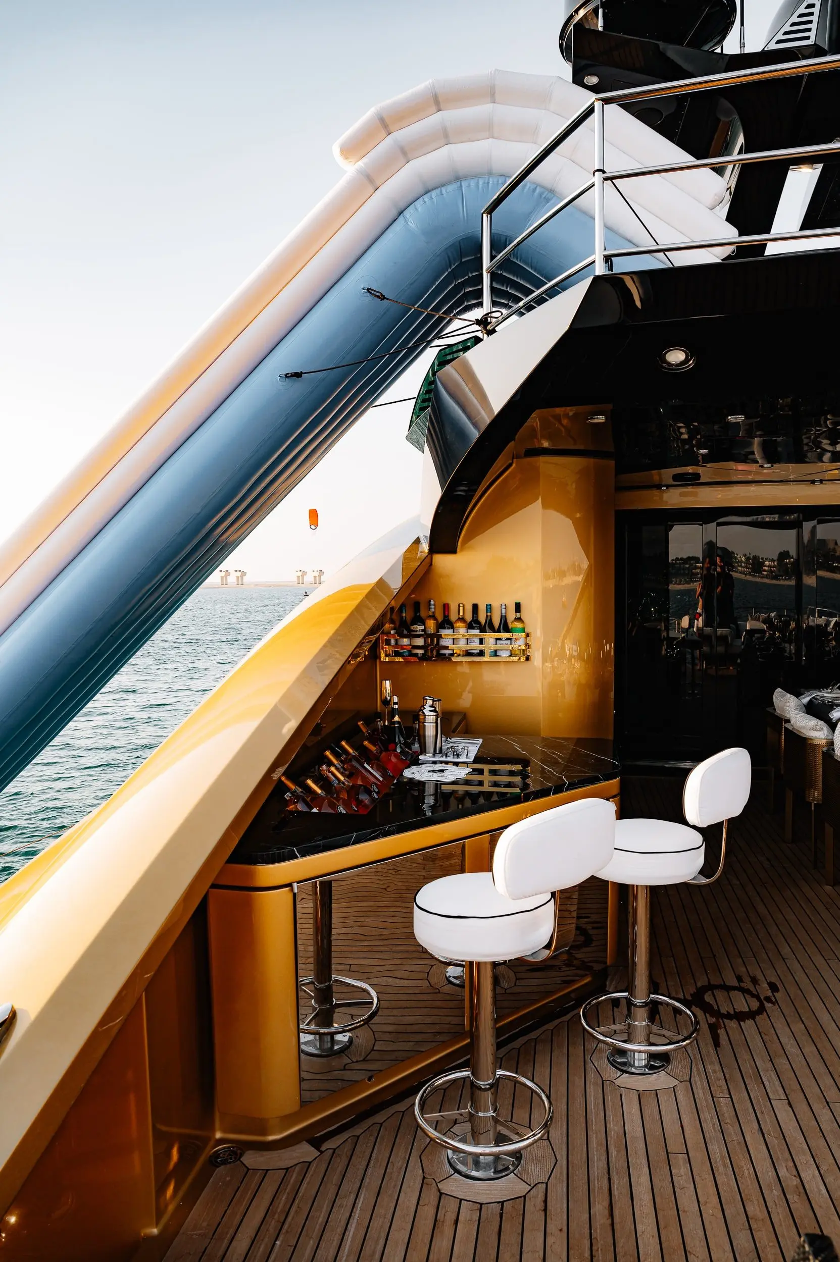 Interior bar with sea view inside Royalty 136 yacht