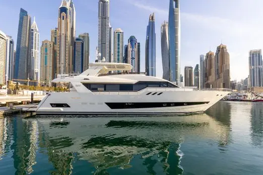Cante 97 yacht docked at Dubai Marina with city skyline