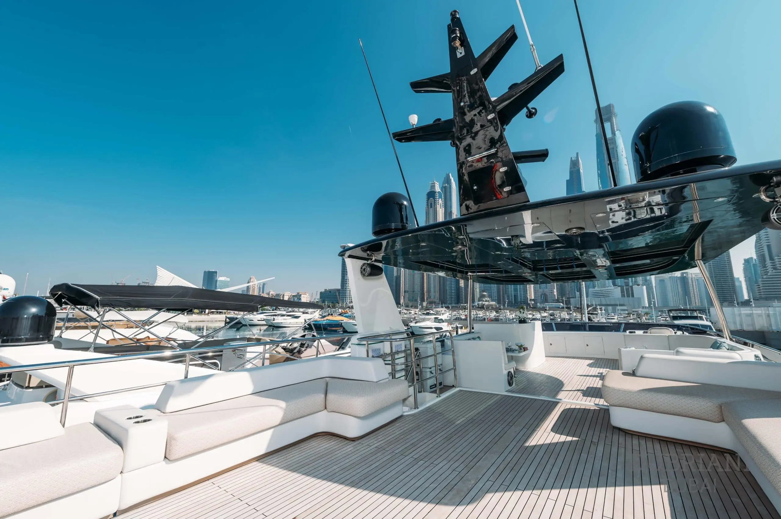 Eclipse yacht upper deck lounge with sunbeds and shaded seating area