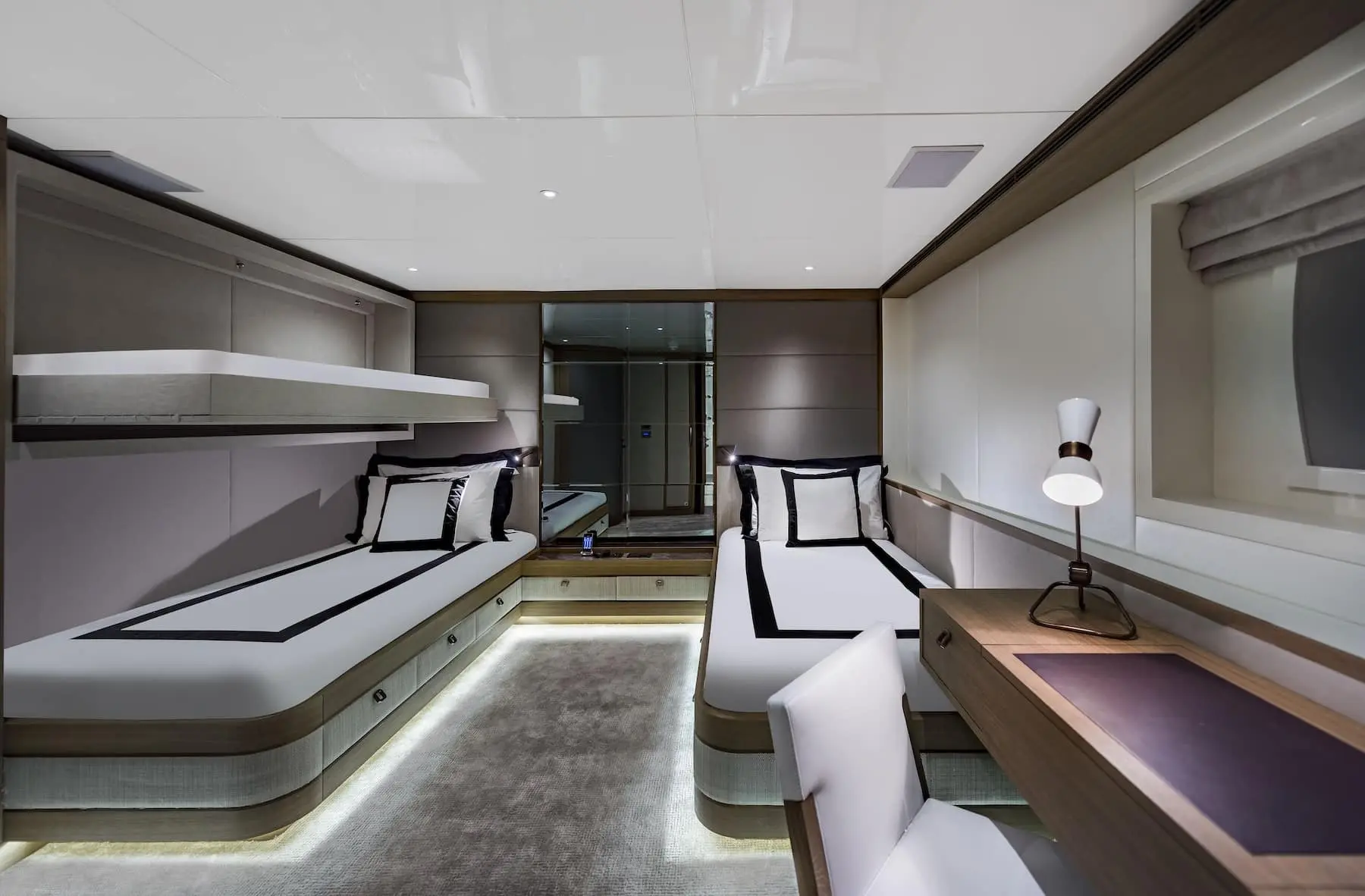 Skyfall 177 yacht formal dining area with long table and designer lighting