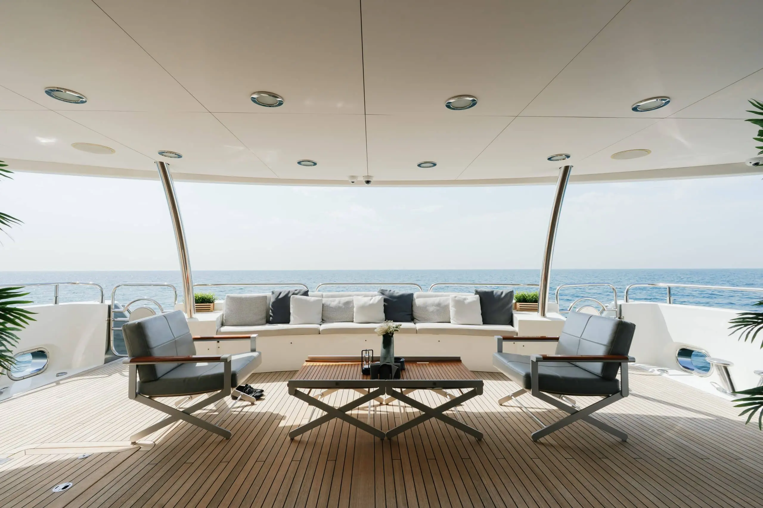 Aurora 130 yacht outdoor deck lounge with sea views and modern seating