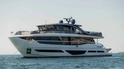 Princess X95 profile at anchor, white hull, Dubai coastline