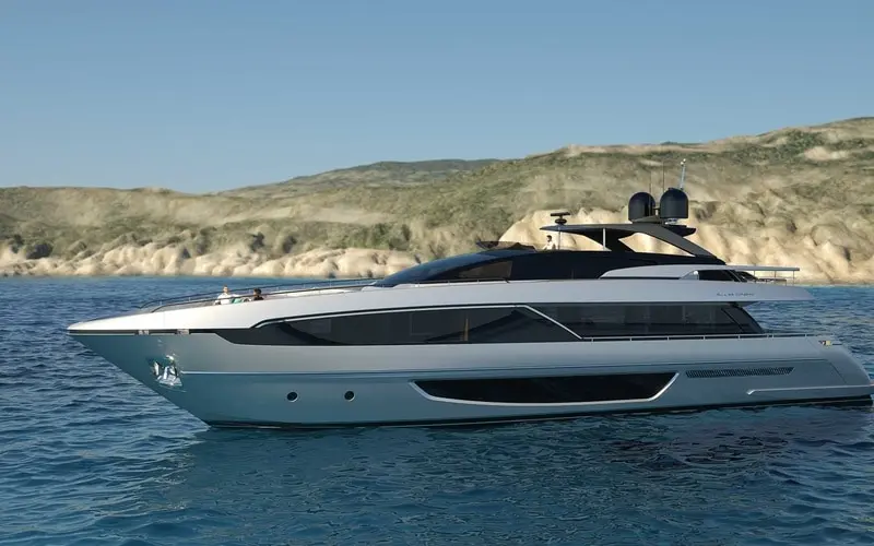 Riva 100 Corsaro port profile at anchor, official shipyard photo