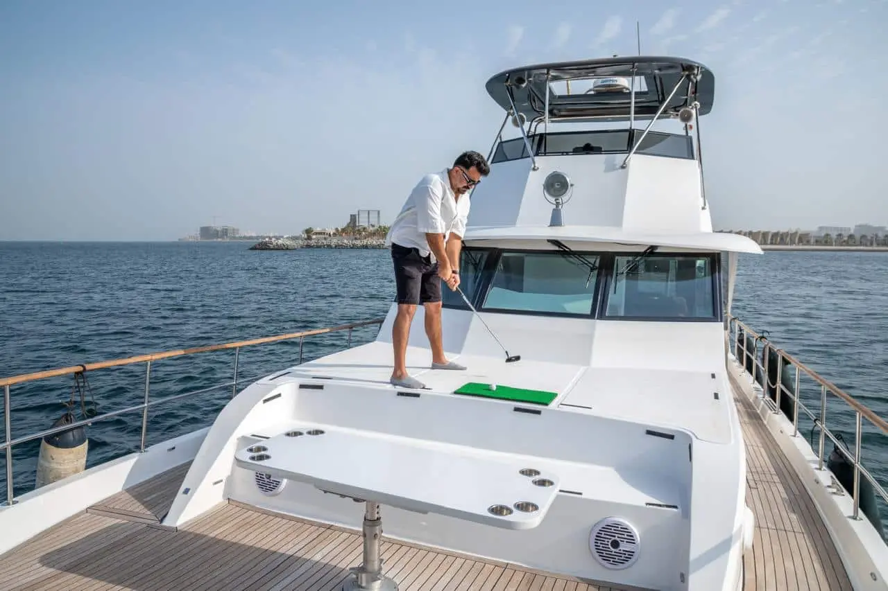 Guest enjoying scenic cruise on Zenith 64 luxury yacht