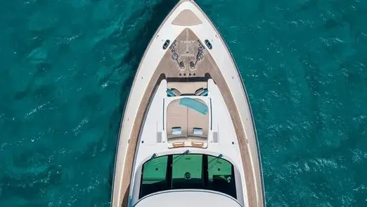Aerial bow view of Zeta 100 yacht with sunbeds in Dubai