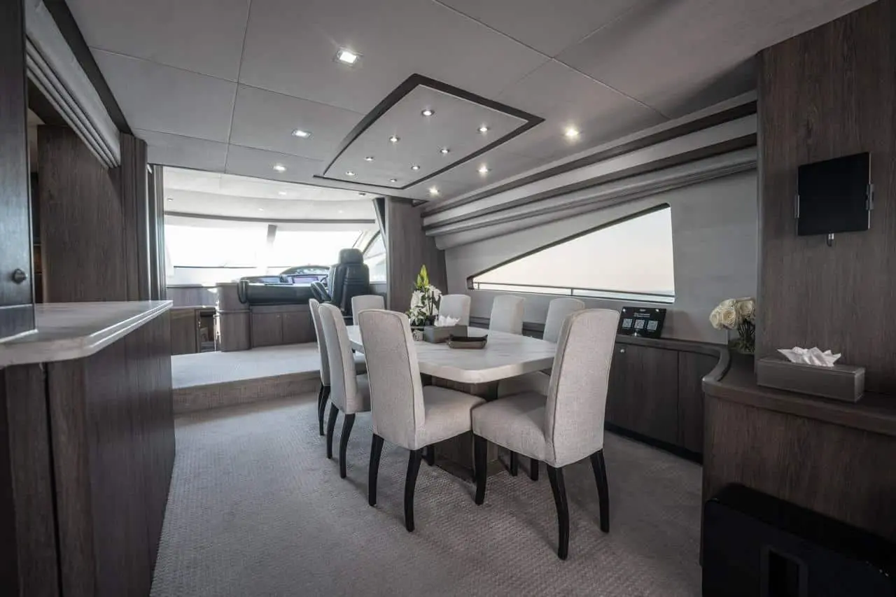 Sunseeker 82 Yacht interior dining area beside the saloon