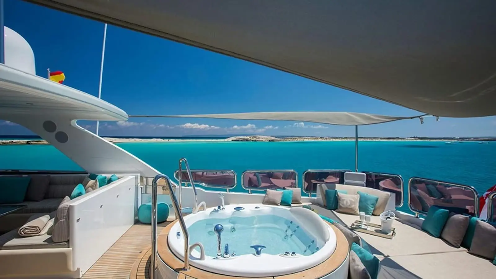 Zeta 100 yacht jacuzzi on upper deck with Dubai skyline view