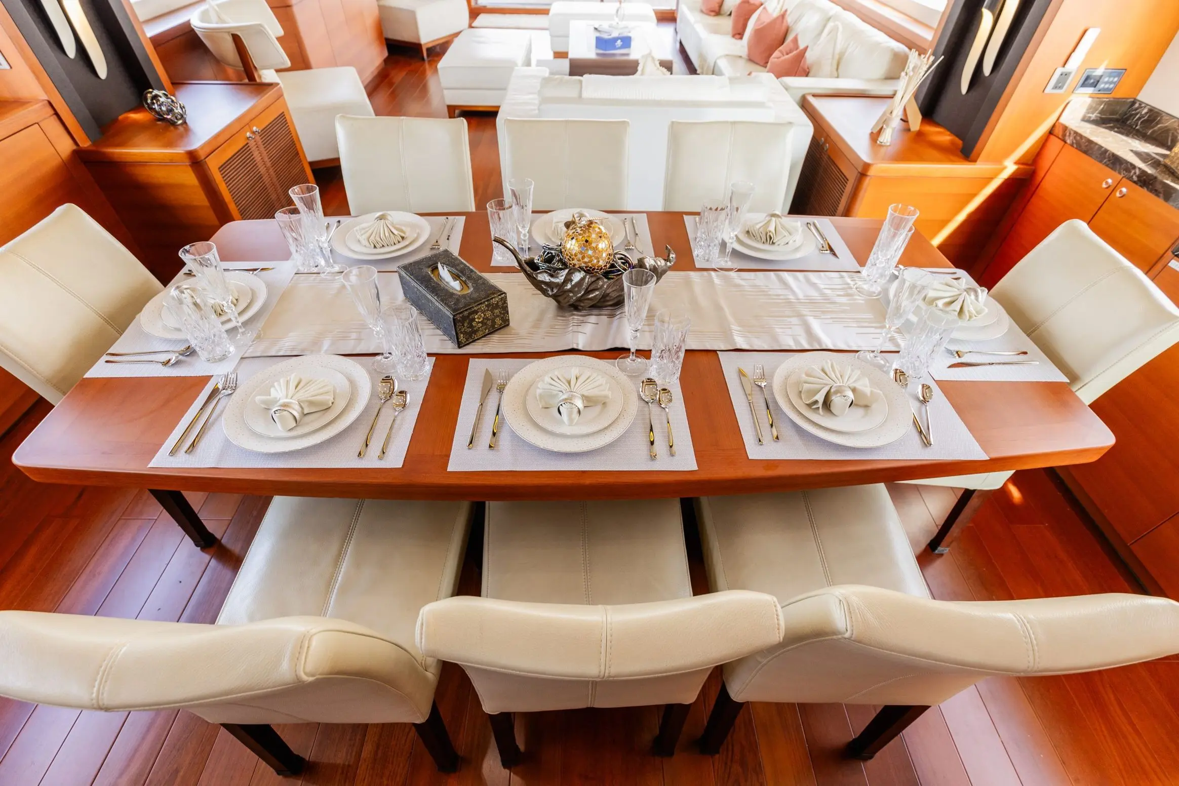 Close view of dining table setting on Cante 97 yacht
