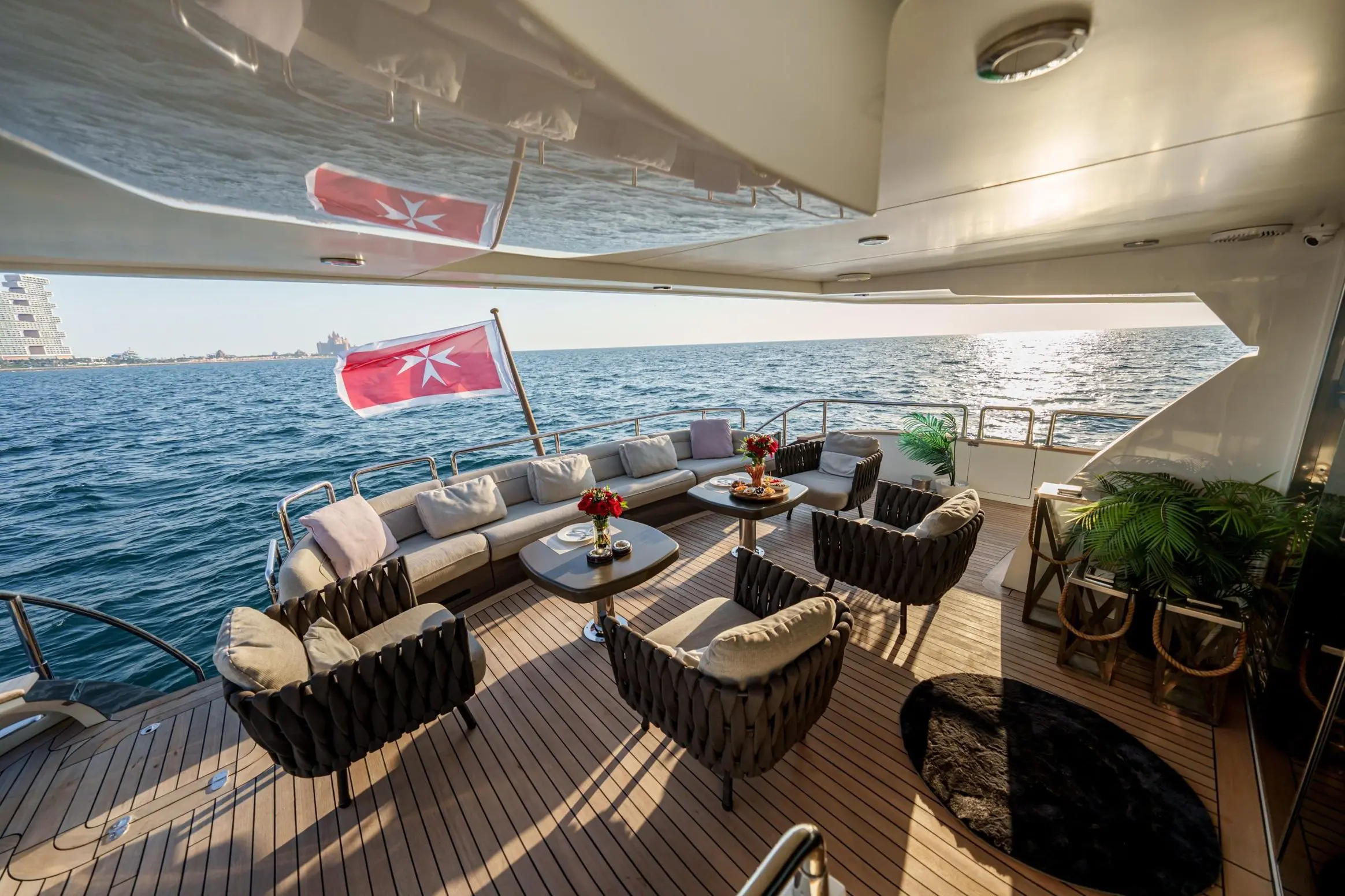 Tatti 110 yacht upper deck lounge with premium outdoor seating