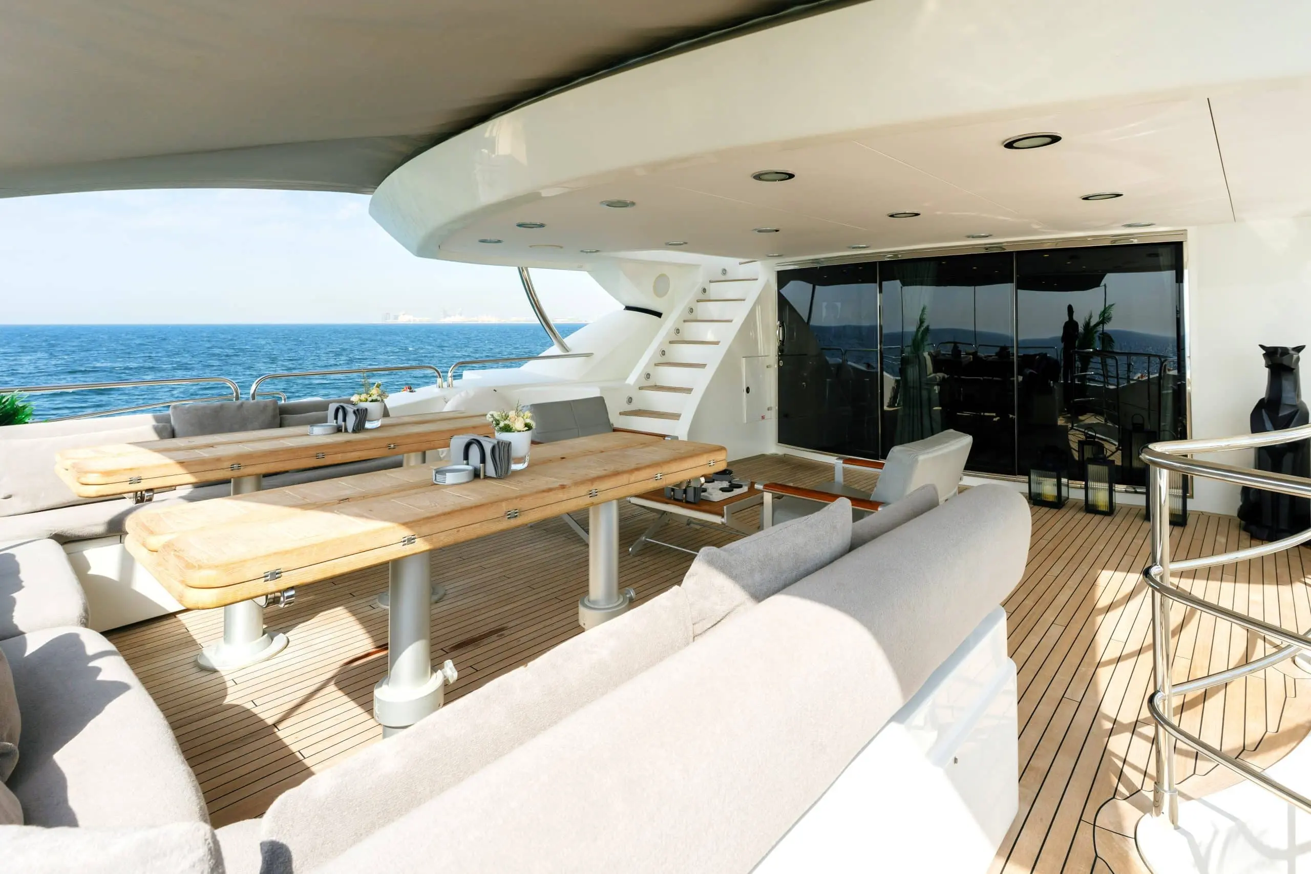 Aurora 130 yacht sun deck with lounging area and open sea views