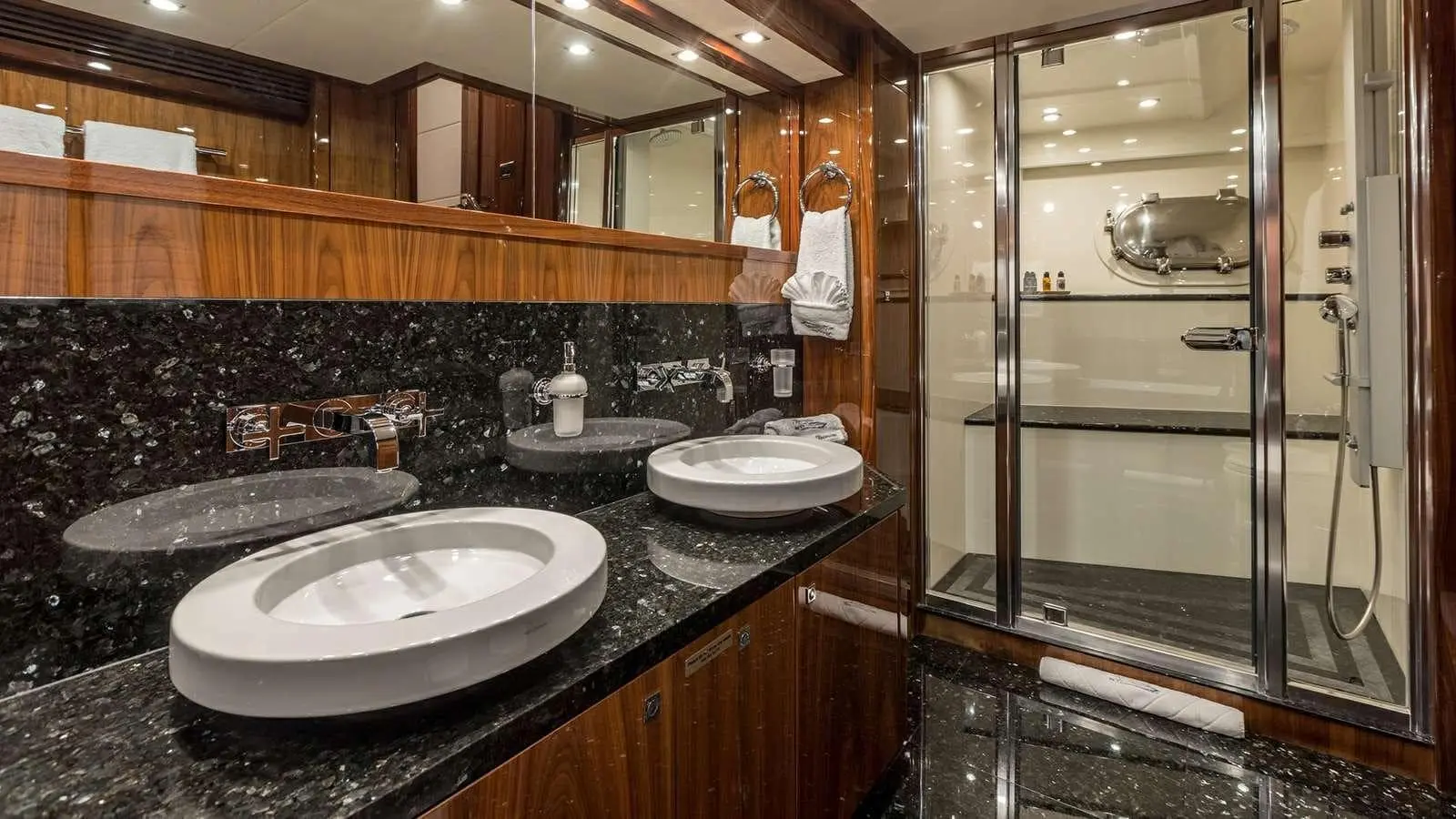 Sunseeker 37M master bathroom with double vanity in dark marble
