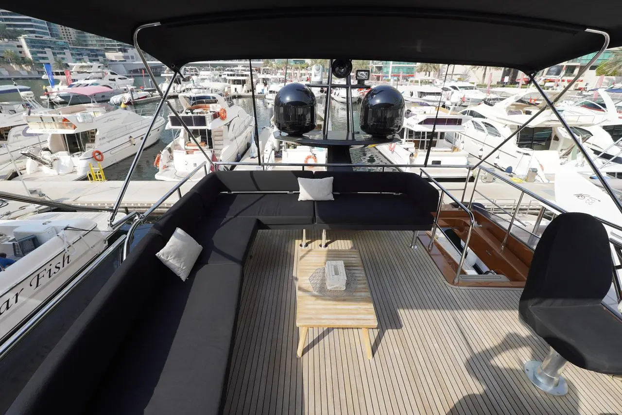Azimut 77 yacht flybridge seating area with marina view