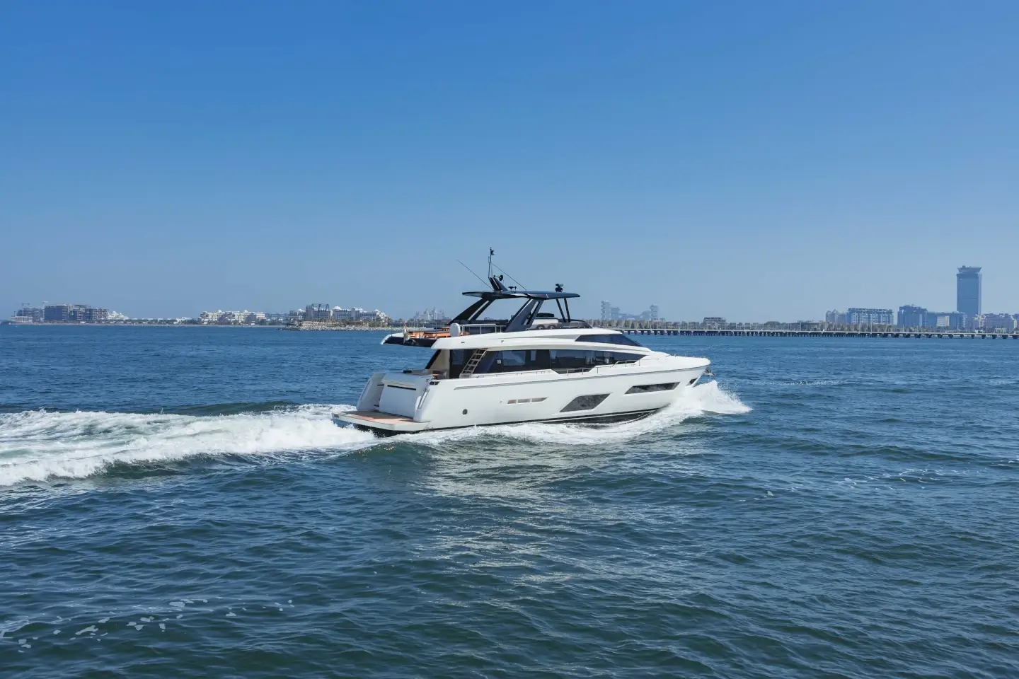 Ferretti 780 flybridge yacht under way on open water off Dubai