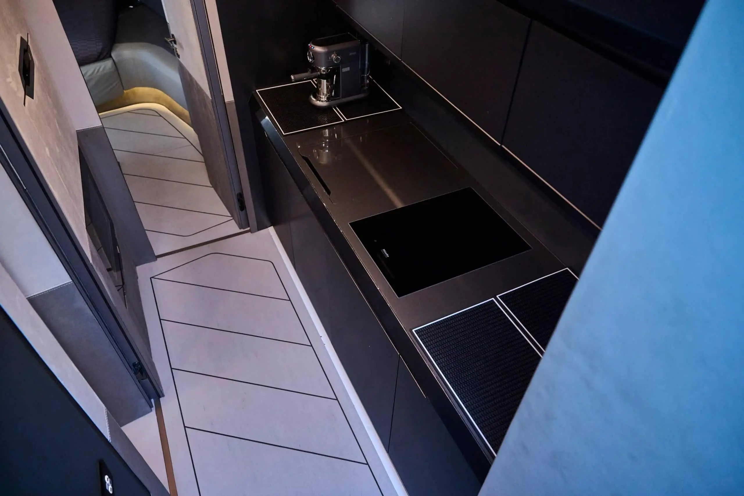 Lamborghini 63 yacht galley kitchen with modern cabinetry and integrated appliances
