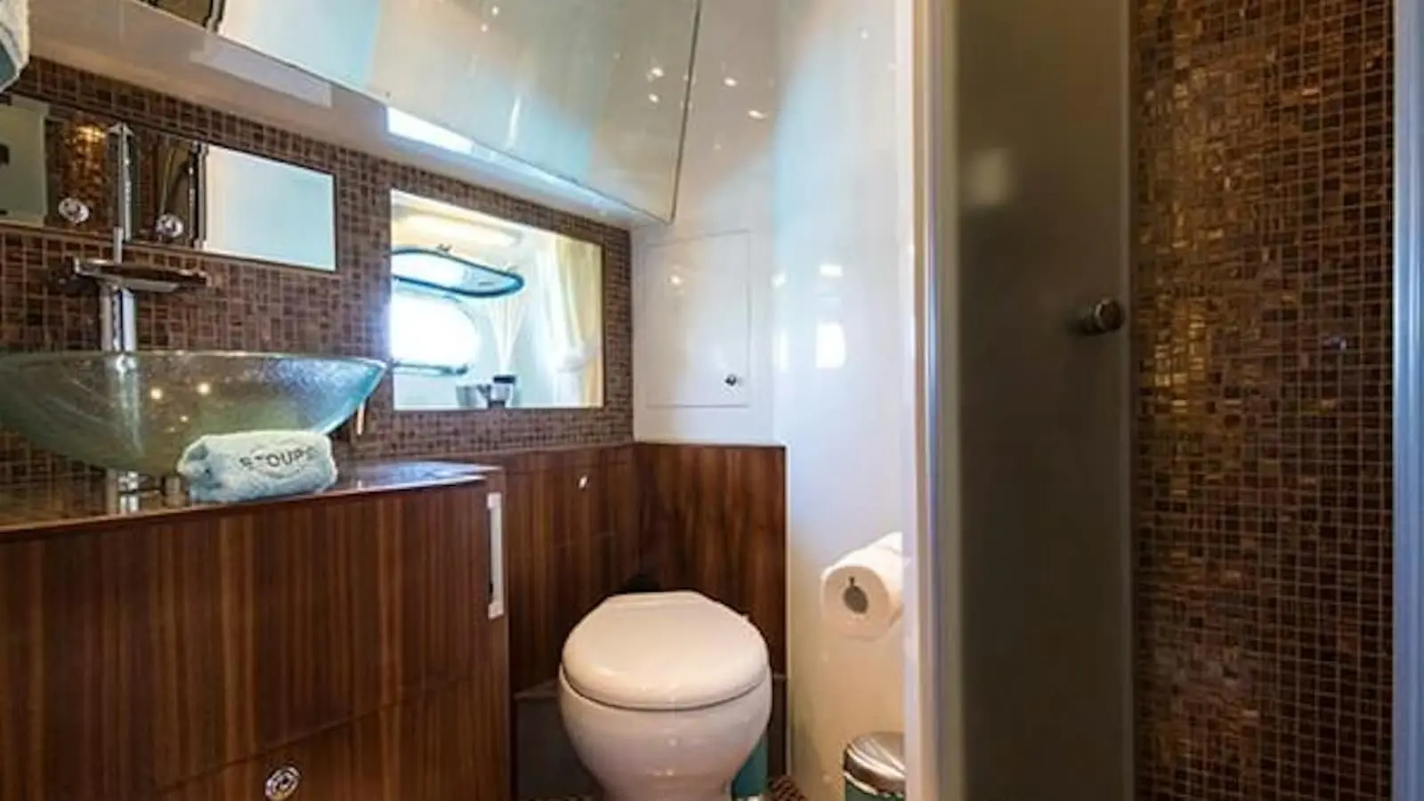 Zeta 100 yacht ensuite bathroom with modern fittings and wooden vanity