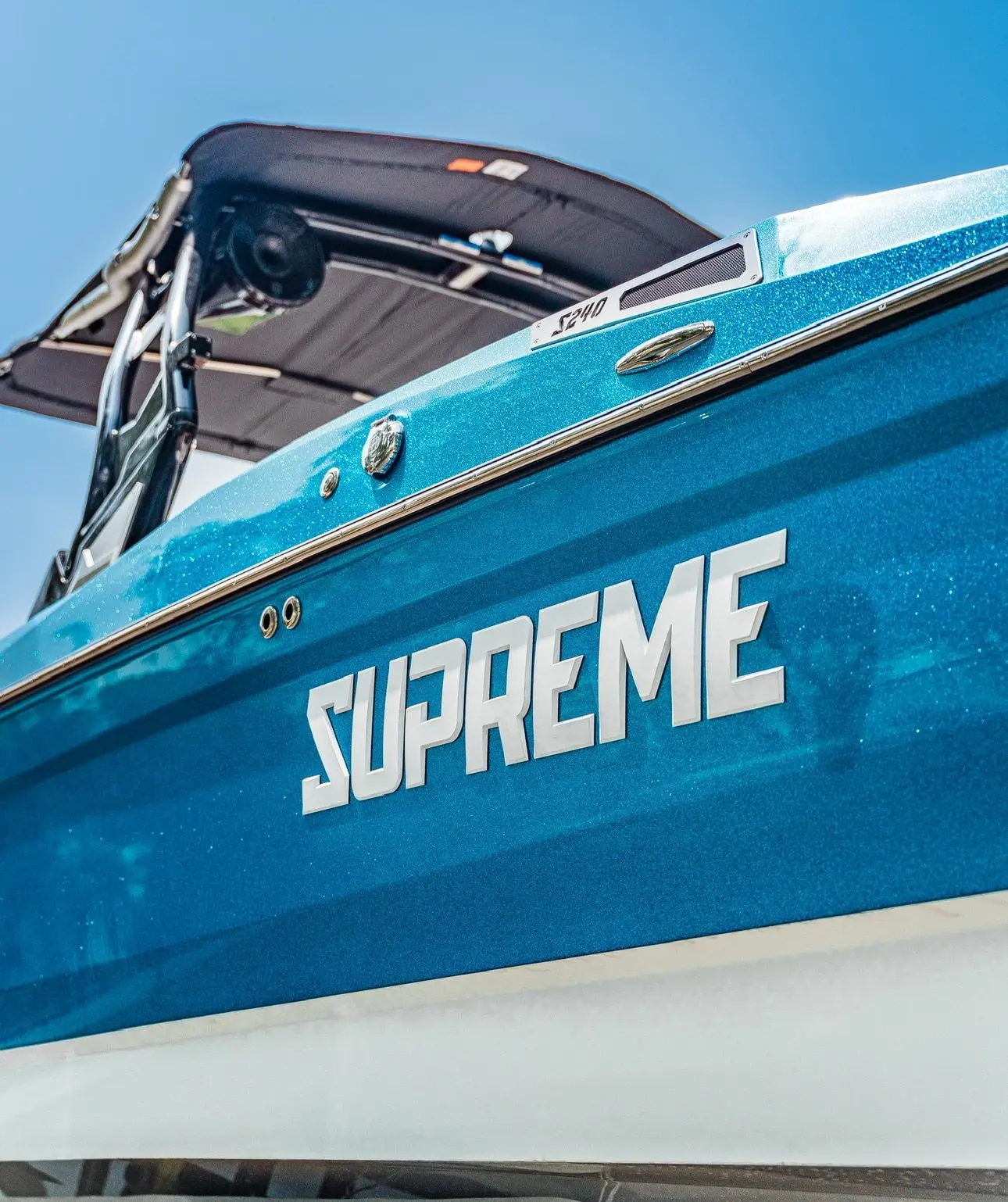 Supreme S240 metallic blue hull side with model badging