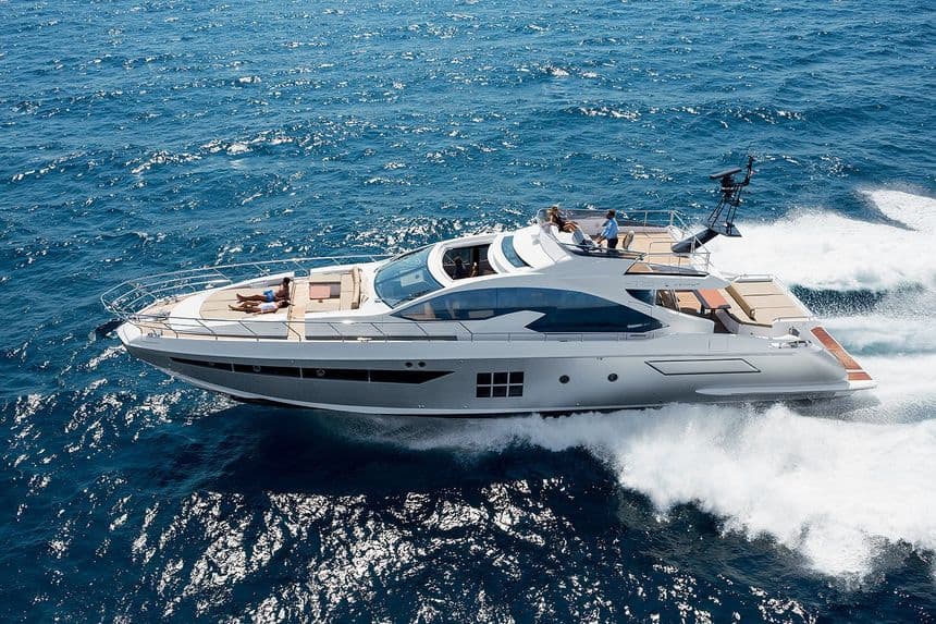 Azimut 77S aerial bow view cutting through open water — shipyard photo