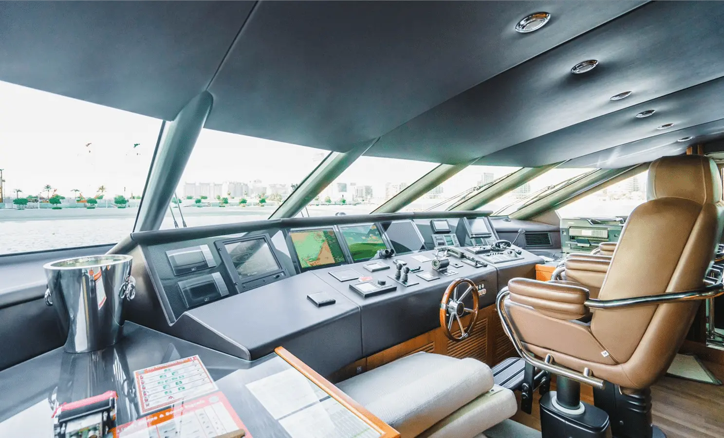Sunseeker 40M wheelhouse helm with navigation screens and chair