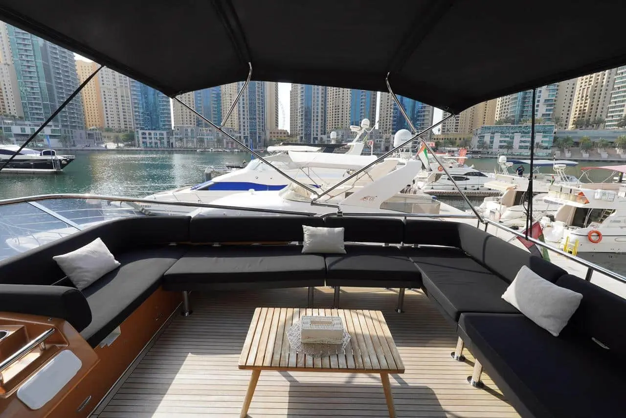 Azimut 77 yacht aft deck seating area with Dubai Marina skyline