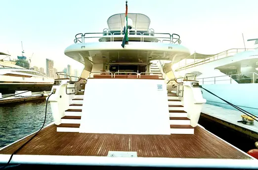 Benetti 120 aft deck with teak flooring and stair access to upper deck