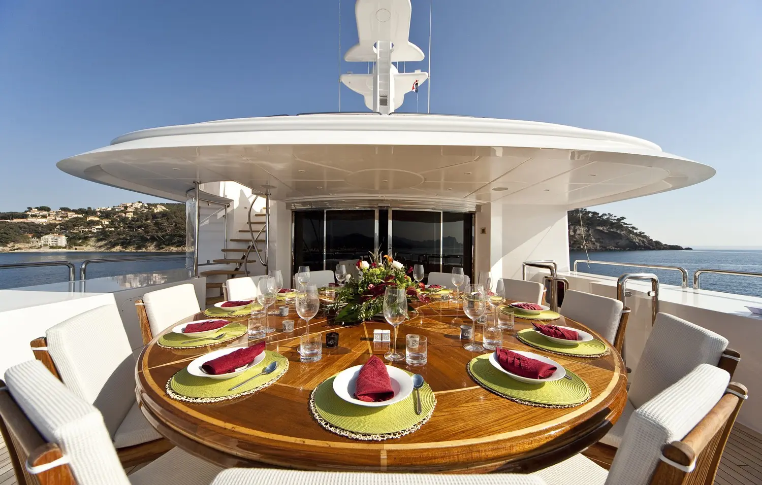 Athena 170 yacht upper deck outdoor lounge and dining area